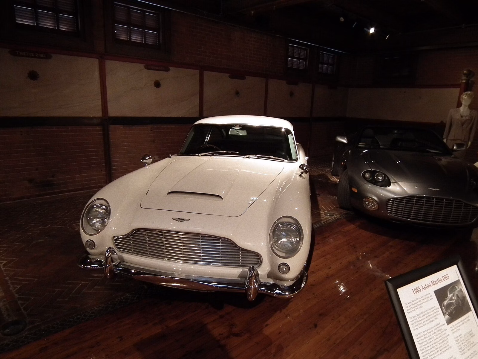 A white Aston Martin DB5 on display at the Larz Anderson Auto Museum
